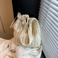 Chic cream hollow woven crochet tote bag featuring lace ribbon bow and metal ring - Beige with Charm