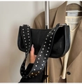 Chic black rivet crossbody bag with shiny faux leather and silver metal studs - Black