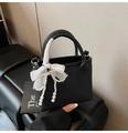 Chic black litchi pattern bucket bag with pearl bow charm and silk ribbon handle - Black
