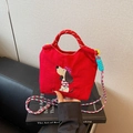 Red fabric crossbody bag with dachshund dog embroidery and multi-color braided strap - Red