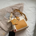 Fashionable beige and ginger yellow crossbody bag with silk ribbon and flower charm - Yellow