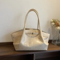 Chic off-white crocodile embossed tote bag with slim handles and metal buckle detail - Apricot