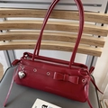 Chic dark red PU leather shoulder bag with bow detail and silver heart charm pendant - Red