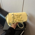 Fashionable yellow PU leather crossbody bag with lace-up detail and metal eyelets for women - Yellow