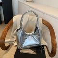 Minimalist silver metallic PU shoulder bag with bow detail on a vintage book - Small / Small Silver