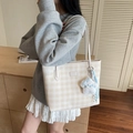 Stylish beige checkered tote bag with a blue plush cat charm and double shoulder straps - Off-white