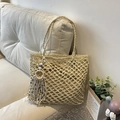 Beige geweven strooien draagtas met Evil Eye kwastje voor zomervakantie aan zee - Broken Wit