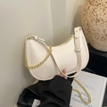 Chic creamy white crescent shoulder bag in smooth faux leather with gold chain detail - White