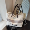 Borsa tote minimalista in tela bianco sporco con manici in pelle marrone e logo - Bianco Sporco