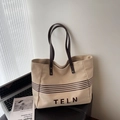 Borsa tote in tela beige con strisce marrone scuro e manici in pelle per uso diario - Cachi