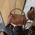 Borsa Boston in pelle scamosciata marrone con manici in pelle e dettagli argento - Marrone