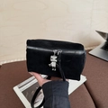 Minimalist black suede crossbody bag with a creative silver robot charm and zipper - Black