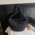 Black heart-quilted crossbody bag with wide shoulder strap in premium nylon finish - Black