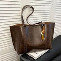 Vintage brown leather tote bag with large capacity and wooden bead charm decoration - With Charm / Brown