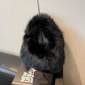 Chic black faux fur cloud handbag for women with soft plush texture and round shape - Black