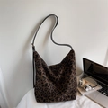 Retro leopard print hobo bucket bag with black adjustable strap for stylish women - Brown