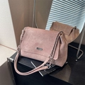 Elegant light pink corduroy shoulder bag with silver chain strap and metallic logo plate - Pink