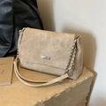 Elegant beige quilted shoulder bag with silver chain strap and metal logo accent - Off White