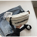 Detail of white half-moon canvas chest bag with black letter print and orange side label - Off White