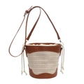 Handwoven straw bucket bag with brown leather trim and adjustable crossbody strap - Off White