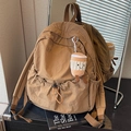 Brown nylon high-capacity backpack for students with a cute plush coffee cup keychain - With Charm / Brown