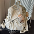 Minimalist cream nylon backpack with a drawstring front pocket and cute plush pendant - With Charm / White
