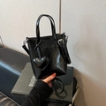 Mini black crocodile embossed straw-style tote bag with heart charm on a green book - Black Heart Bag / Black