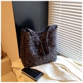 Close-up of leopard print tote bag fabric with dark grey patterns and wide shoulder strap - Large Pattern Gray