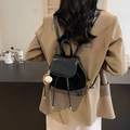 Mini black glossy leather backpack with drawstring closure and baseball charm detail - Black with Pendant