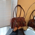 Vintage brown suede bowling handbag with leather trim and plush bear charm - Frosted Coffee with Pendant