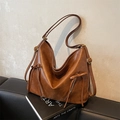 Retro brown leather large capacity crossbody bag with decorative fringe and zippers - Brown