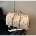 Dettaglio borsa da viaggio con motivi di orsetti, zip dorata e tracolla classica - Bianco Sporco