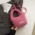 Pink plush faux shearling bucket bag with a top handle and shoulder strap - No Pendant / Rose Red