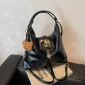 Black glossy PU leather Hobo bag with gold buckle and brown plush bear charm - Black with Pendant