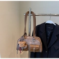 Close-up of vintage brown tote bag with double front pockets and cute bear charm - With Charm / Coffee