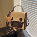 Vintage beige and brown leather handbag with metal buckles and a cute plush bear charm - With Charm / Off-white and Coffee