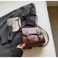 Deep brown vintage faux leather handbag with dual buckle and polished glossy finish - No Pendant / Brown