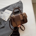 Retro two-tone leather crossbody bag with brown contrast panels and top handle - With Pendant / Coffee
