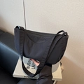 Minimalist black nylon crescent shoulder bag with adjustable strap for daily commute - Black