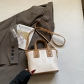 Mini borsa a secchiello panna e marrone con trama floreale a rilievo e tracolla sottile - Beige Cachi (Senza Ciondolo)