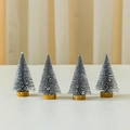 Set of four 10cm blue cedar Christmas trees with snow effect and wooden bases - Silver