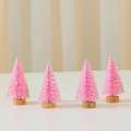 Pack of 4 pink mini cedar Christmas trees with glitter powder and wooden base - Pink