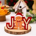 Décoration de Noël JOY en bois avec bonhomme de pain d'épice et nœud sur socle rond - Style Bonhomme Pain d'Épices JOY Noël en Bois