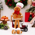 Pupazzo di pan di zenzero con cappello da chef e fiocco rosso su auto d'epoca rossa - Ornamento Omino Pan di Zenzero Maschio Gambe Lunghe