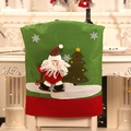Christmas chair cover featuring 3D Santa skiing and tree design in red and green colors - Skiing Santa Claus