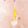 Easter gnome plush ornament in bright yellow with pink bunny ears and floral hat - Yellow