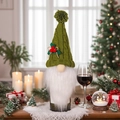 Knitted green Christmas gnome wine bottle cover with white beard and festive berries - Green Wine Bottle Cover