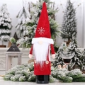 Christmas gnome wine bottle cover with red snowflake hat and white faux fur beard - Red Beard Style