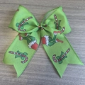 Nœud de Noël vert avec motifs Grinch et sucres d'orge pour décoration festive - Style Grinch