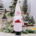 Christmas gnome wine bottle cover with red embroidered snowflake hat and white beard - Red Braid Style